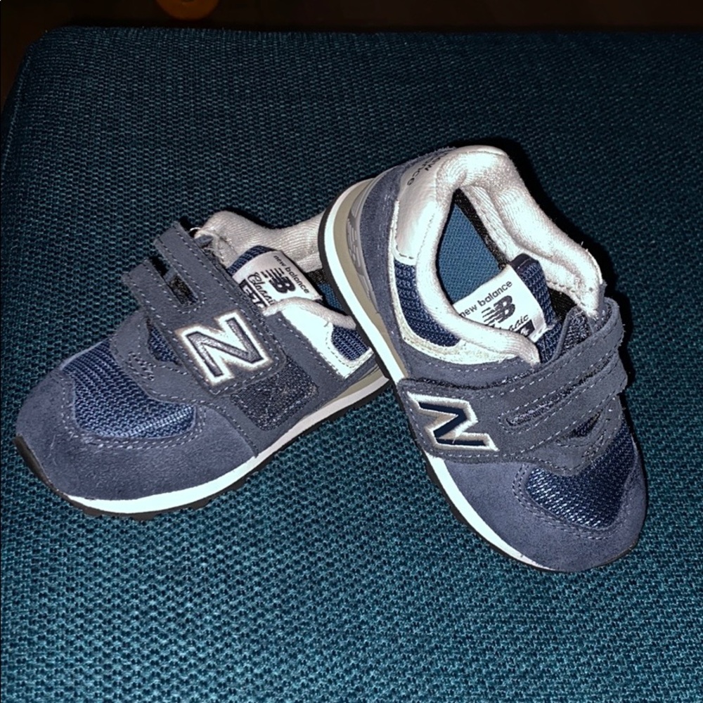 Baby/Toddler New Balance tennis shoes.